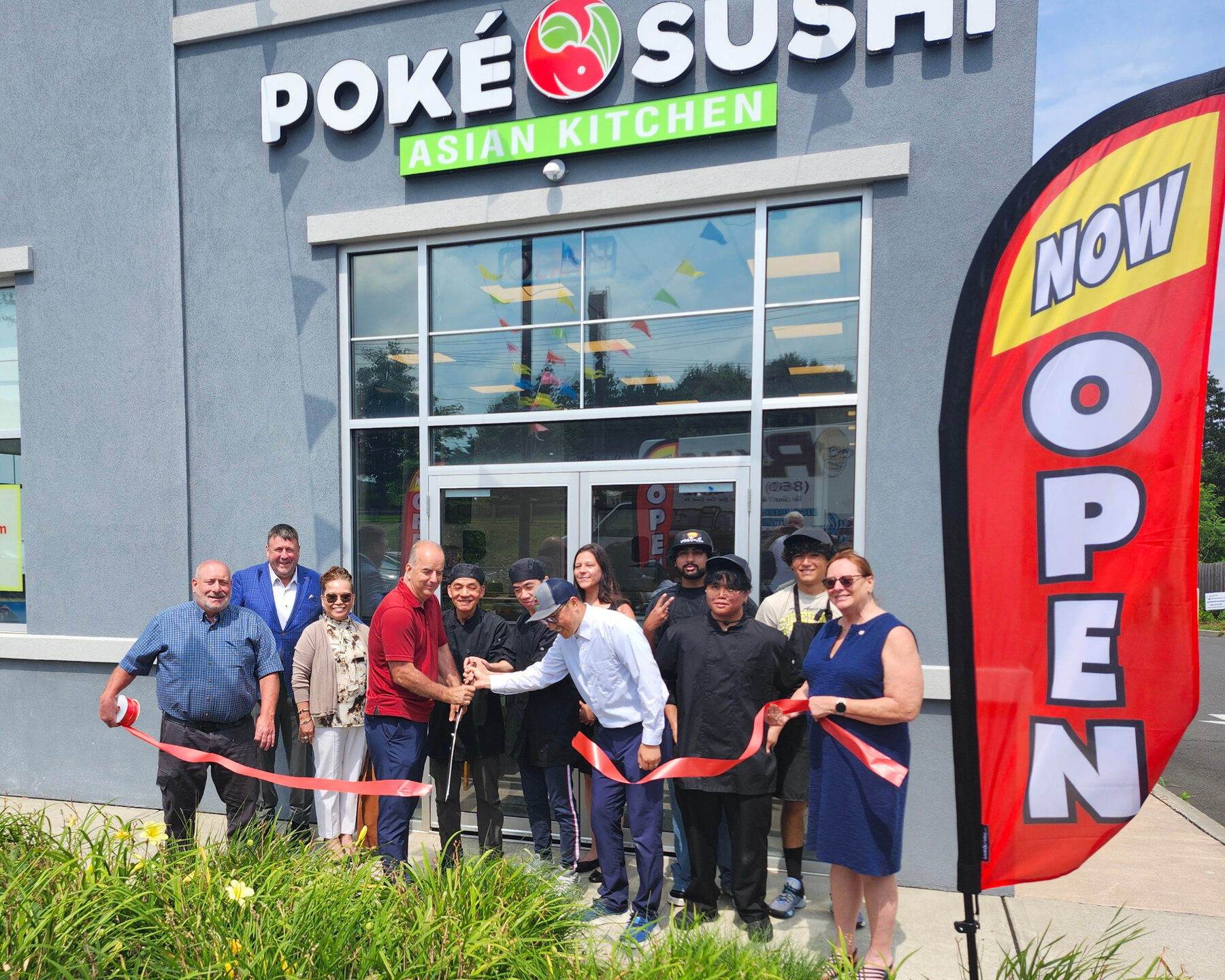 Poké Sushi ribbon cutting